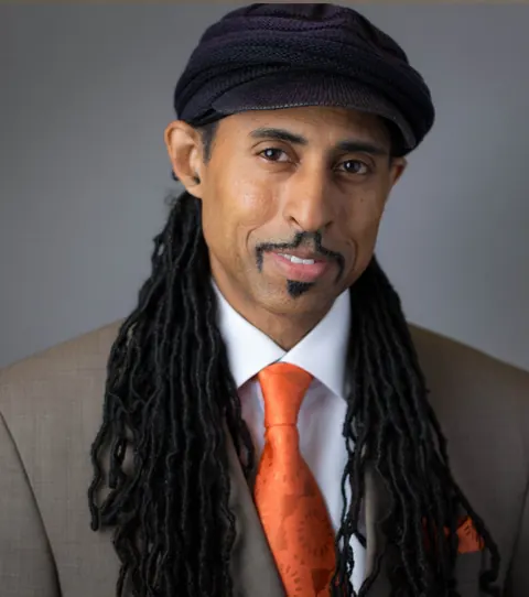 Portrait of Dr. Mustafa Santiago Ali
